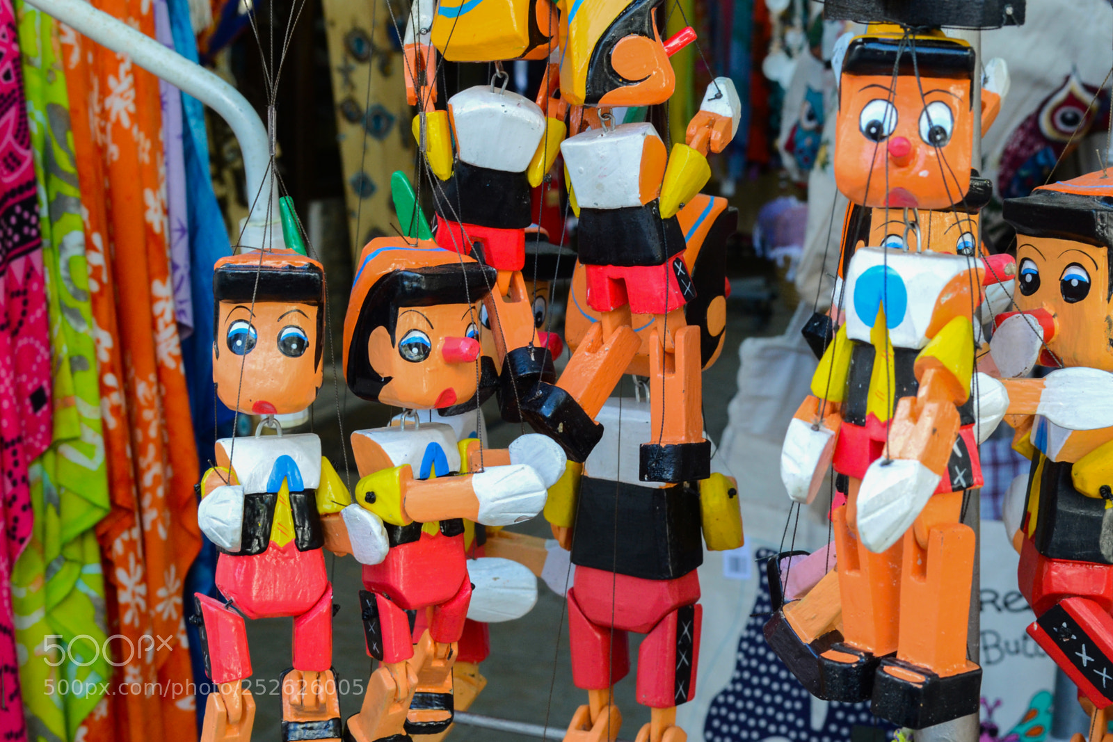 Nikon D3100 sample photo. Group of wooden pinocchio photography