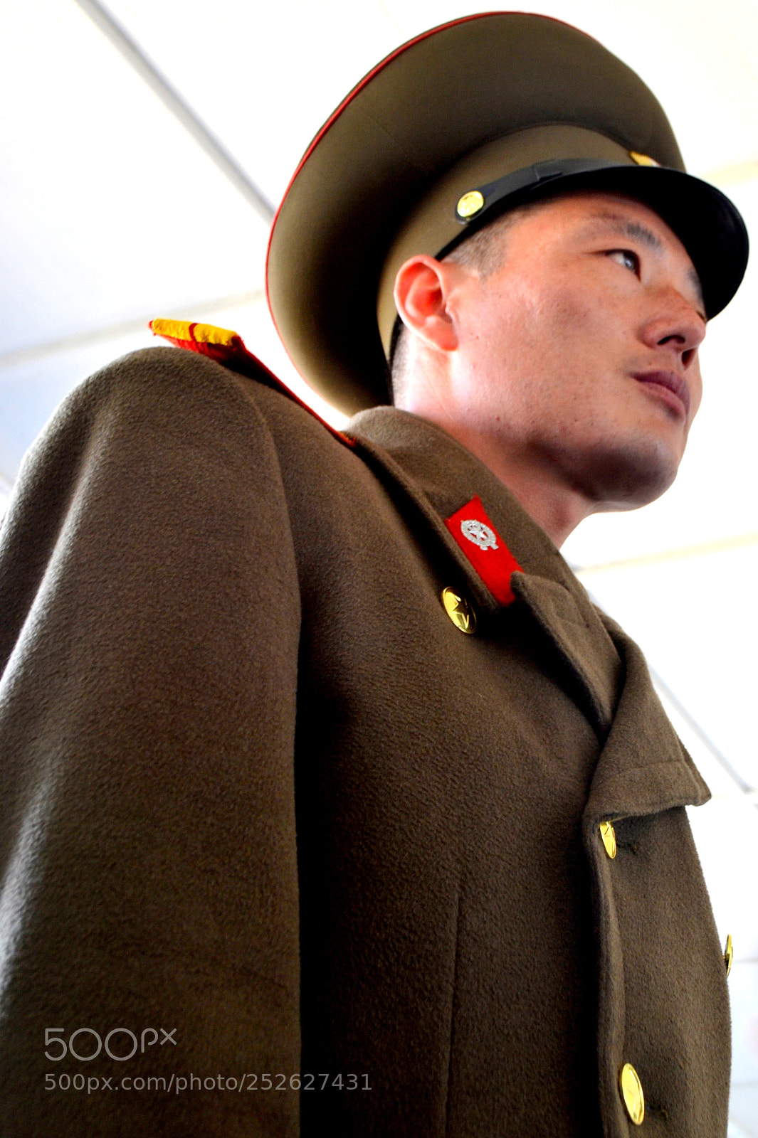 Nikon D3100 sample photo. North korean soldier at photography