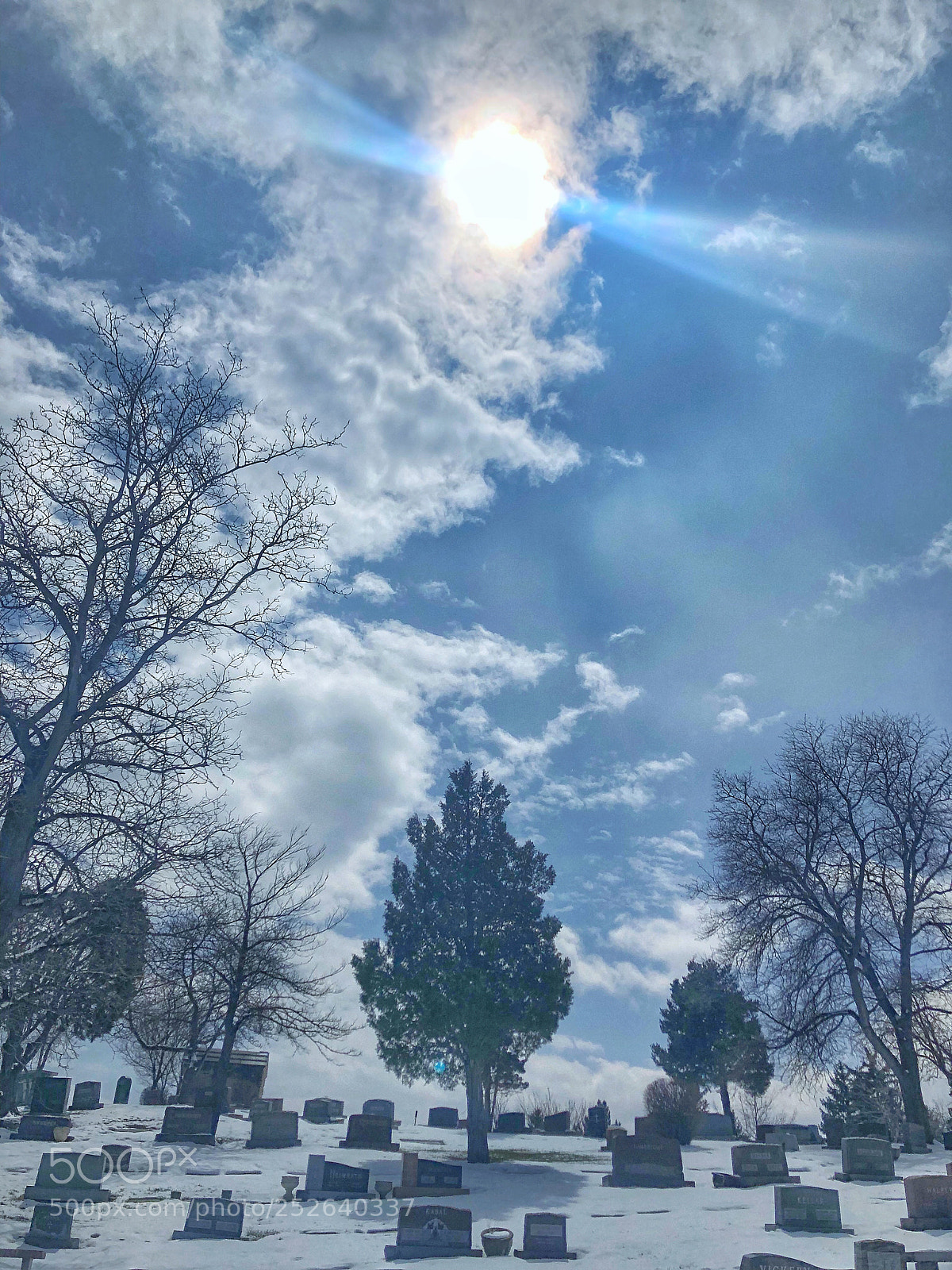 Apple iPhone 8 Plus sample photo. Sun clouds & cemetery snow photography