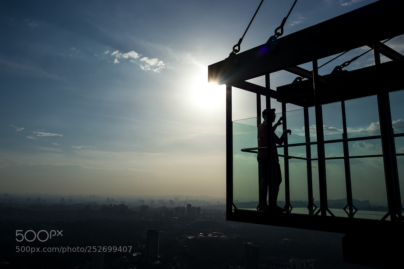 Leica Q (Typ 116) sample photo. Man in skybox of photography