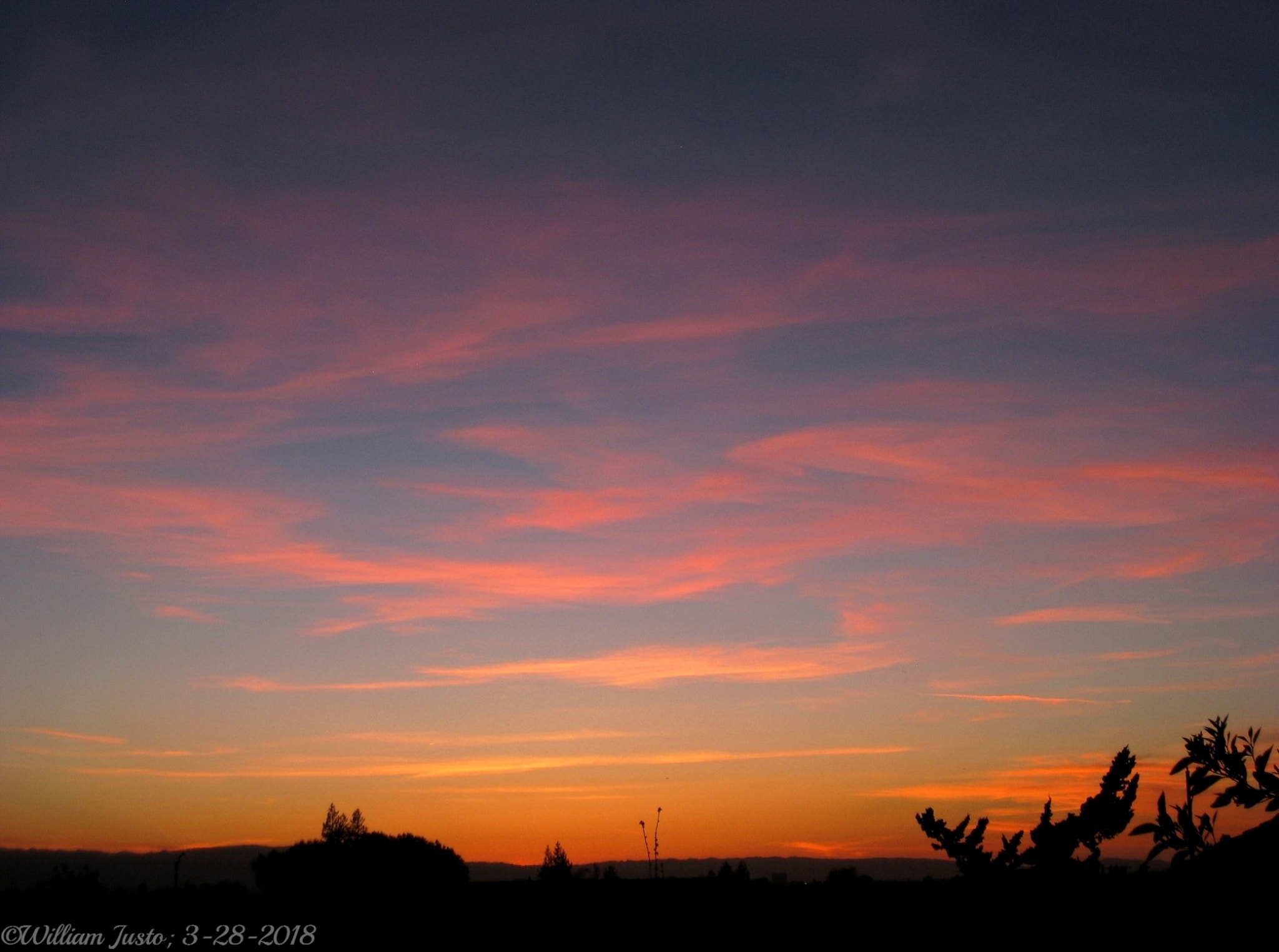 Canon PowerShot SD1100 IS (Digital IXUS 80 IS / IXY Digital 20 IS) sample photo. Clouds glowing with color at sunset (3-28-18) photography