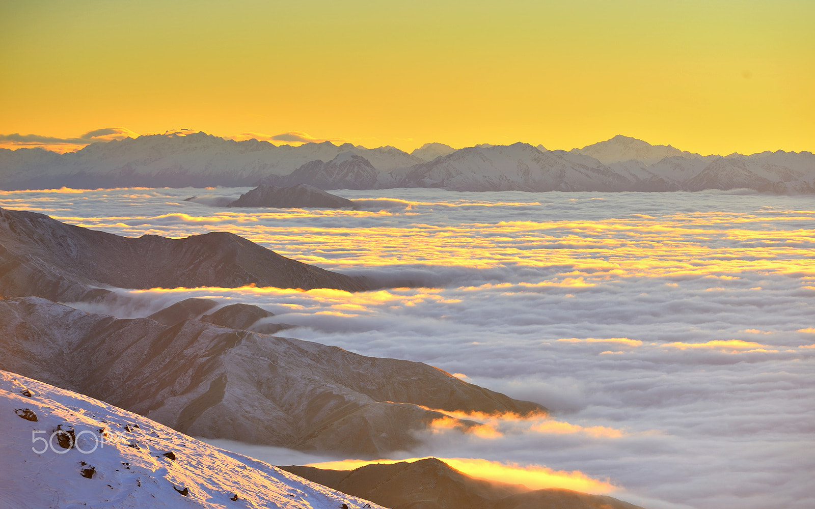 Nikon AF-S Nikkor 70-200mm F2.8G ED VR II sample photo. Sunlight shines through clouds into mountains photography