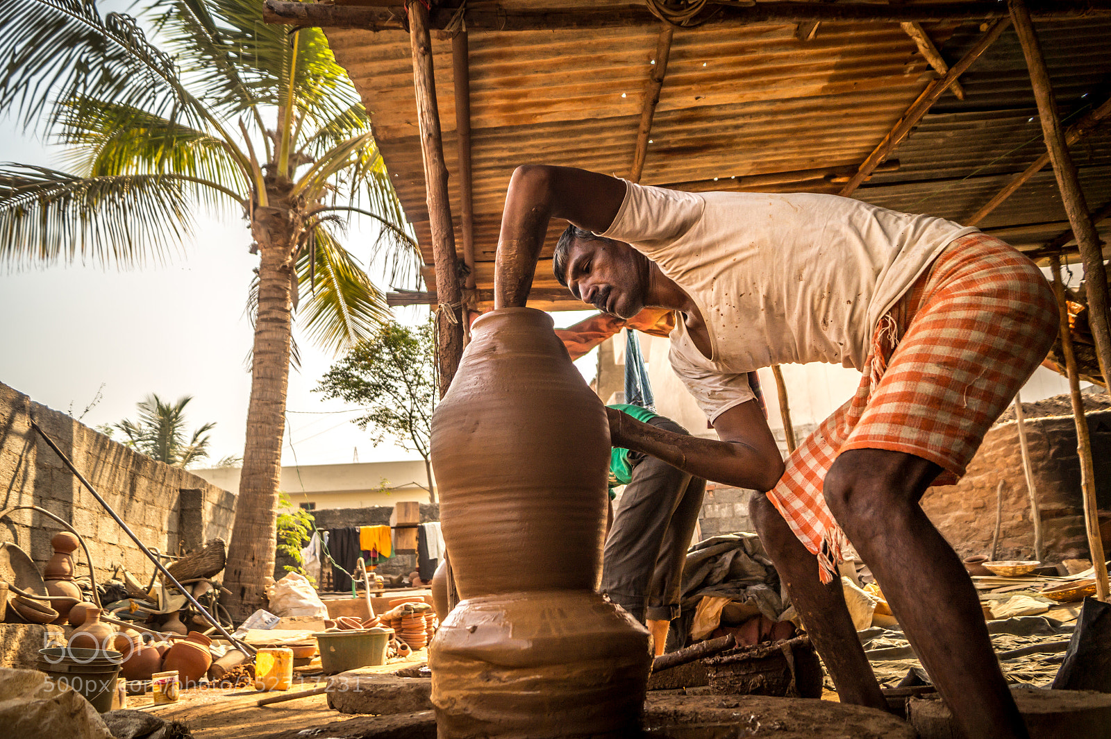 Sony SLT-A58 sample photo. The potter man photography