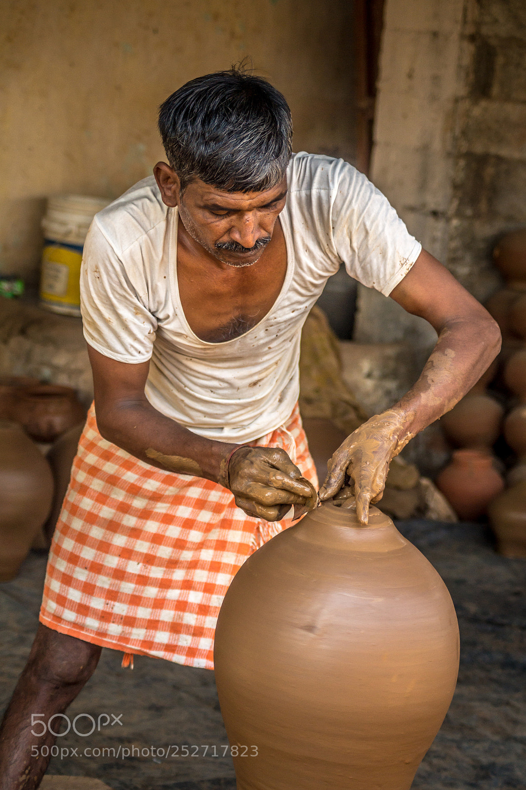 Sony SLT-A58 sample photo. Loops in clay photography