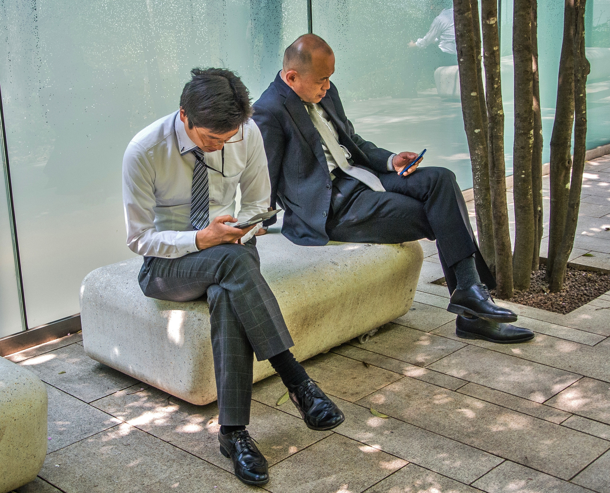 Nikon 1 V1 sample photo. Two men watching mobile phones. photography
