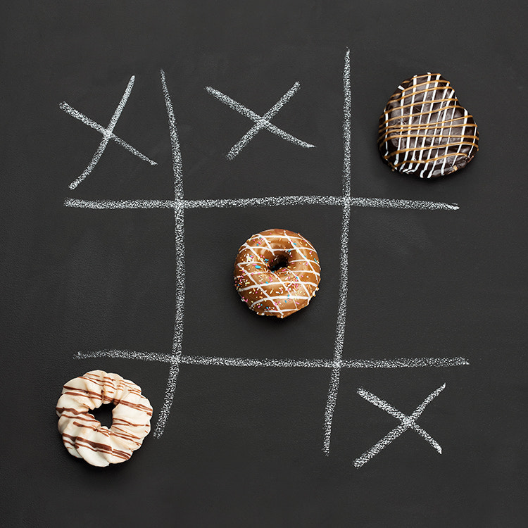 Noughts and Crosses with Doughnuts
