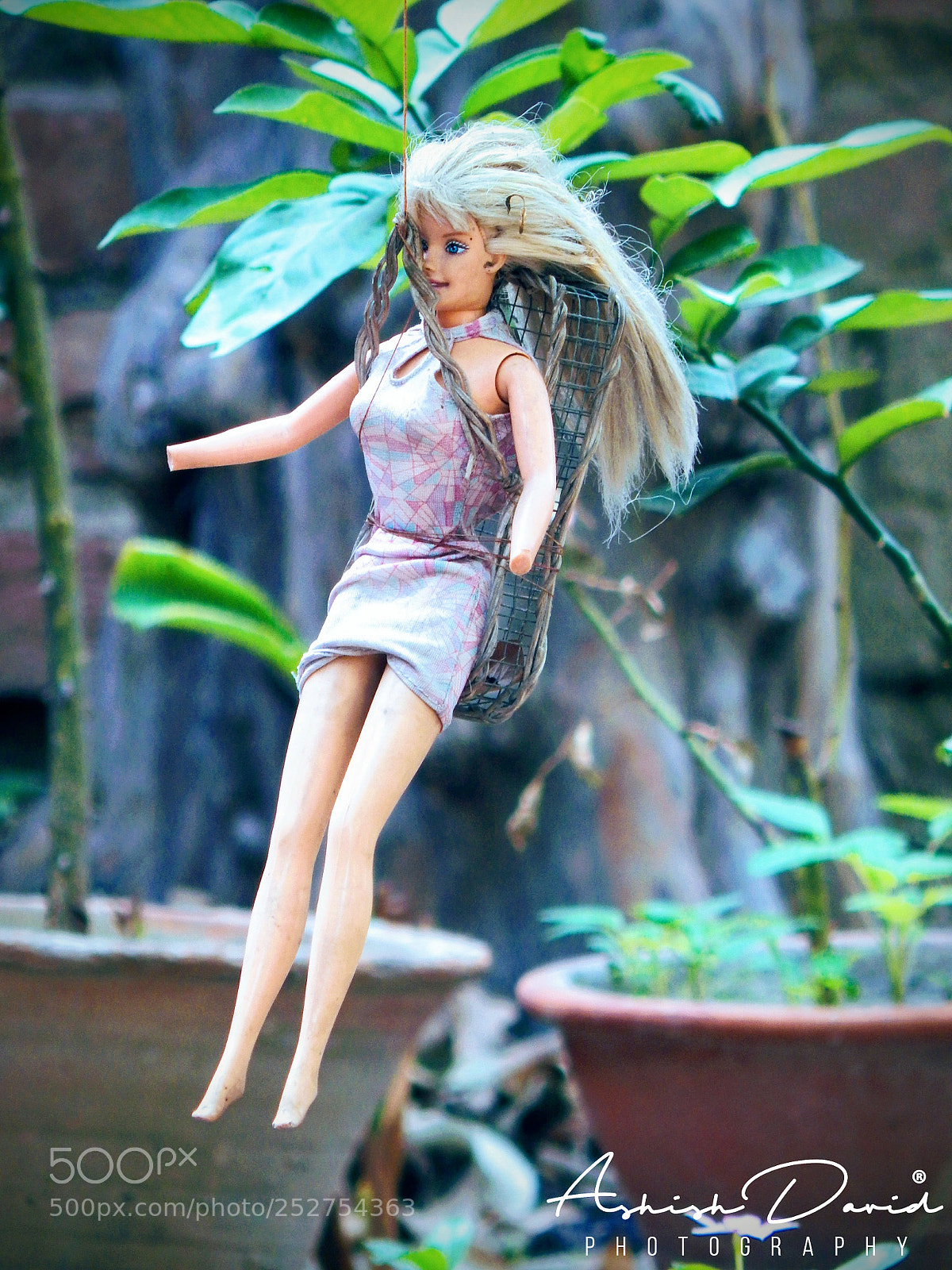 Nikon Coolpix L830 sample photo. Garden keeper doll photography