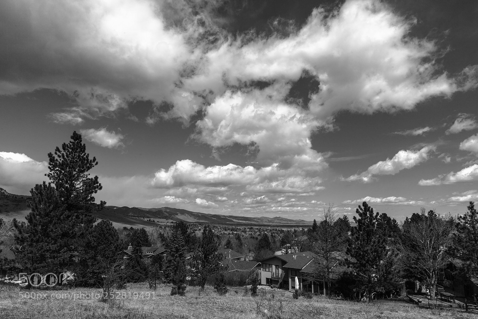Canon EOS 5D Mark II sample photo. Clouds over boulder photography