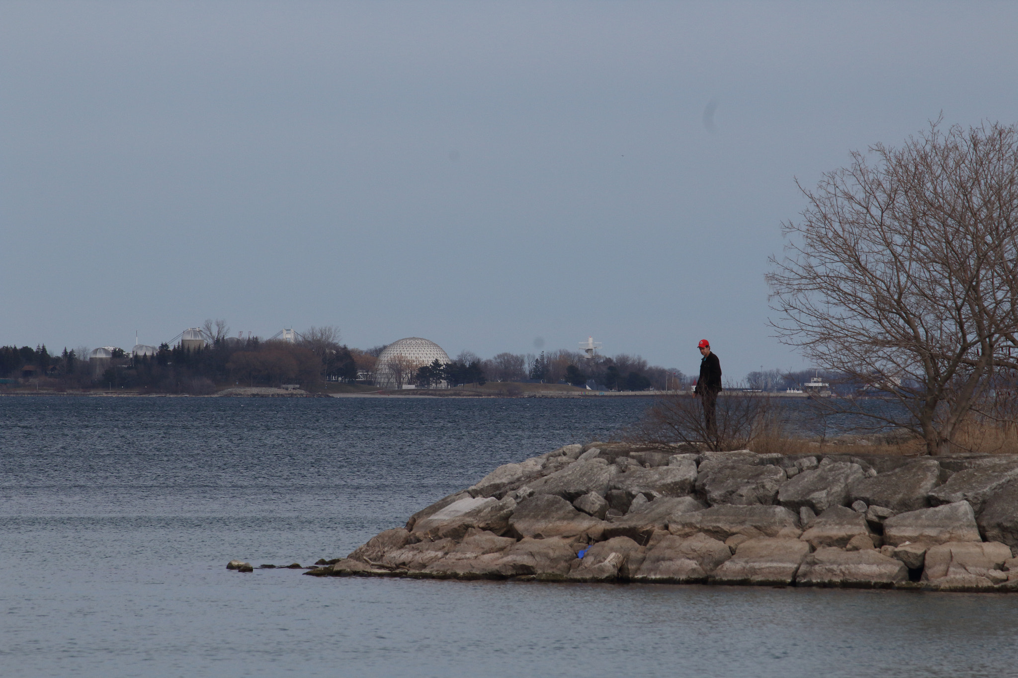Canon EF-S 55-250mm F4-5.6 IS II sample photo. Man overlooking bay photography