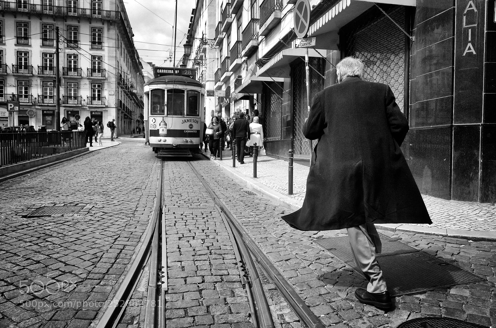 Ricoh GR sample photo. Catching the tram photography