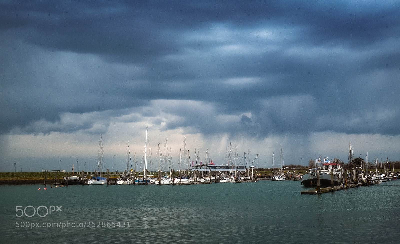 Fujifilm X-T1 sample photo. Dark clouds over burghsluis photography