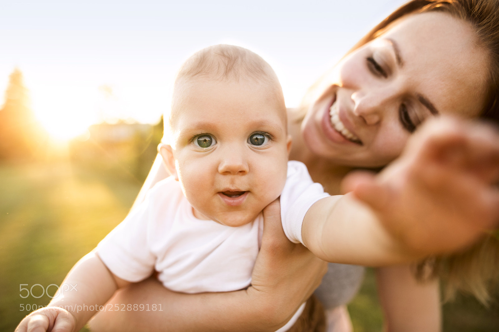 Nikon D5 sample photo. Young mother holding baby photography