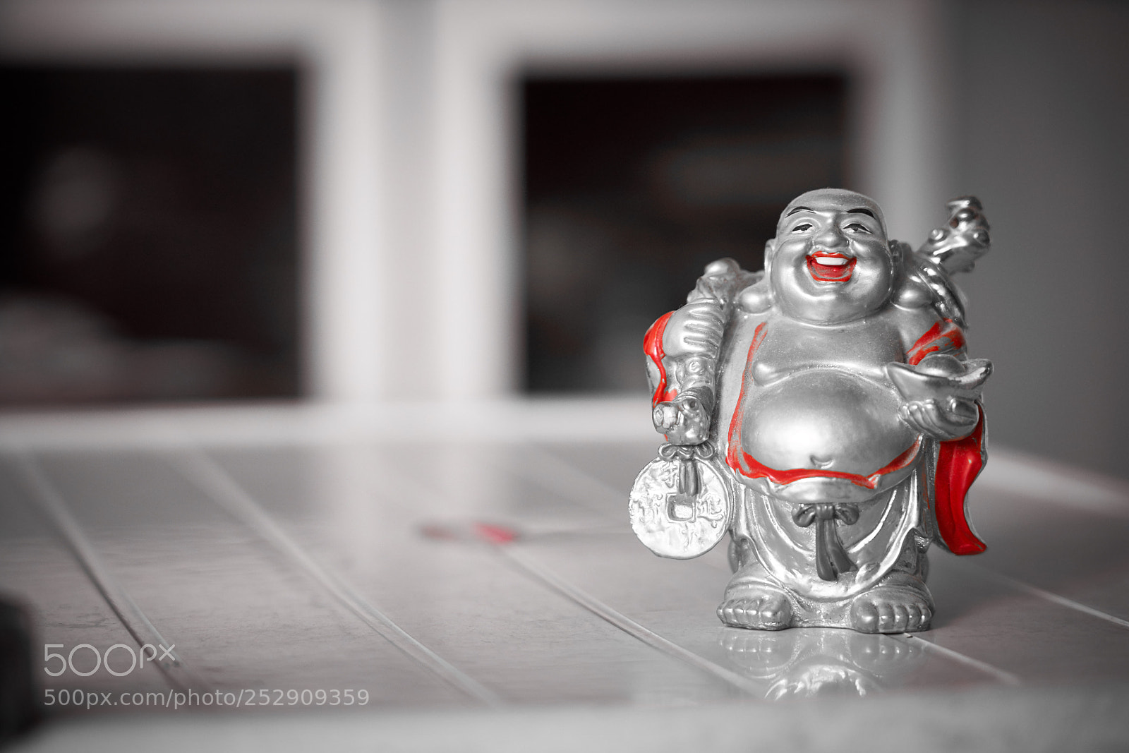 Sony a7R III sample photo. B&w smiling buddha photography