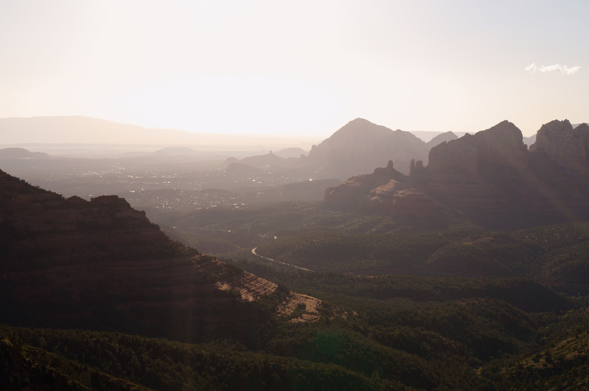 Sony Alpha NEX-F3 sample photo. The sunset light fills the valleys photography