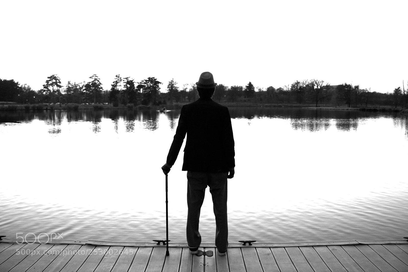 Canon EOS 1000D (EOS Digital Rebel XS / EOS Kiss F) sample photo. Man on pier by photography
