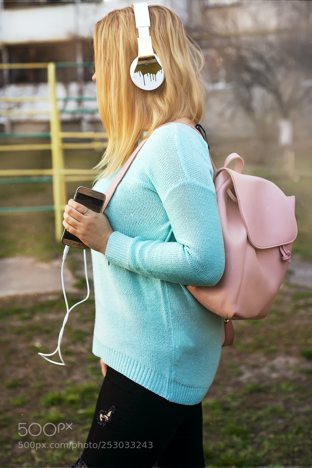 Nikon D610 sample photo. Girl connects the headphones photography