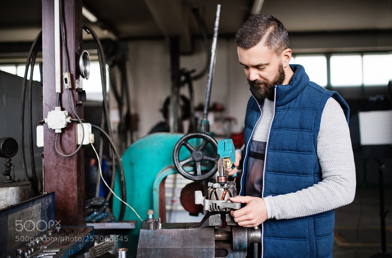 Nikon D5 sample photo. Man mechanic repairing a photography
