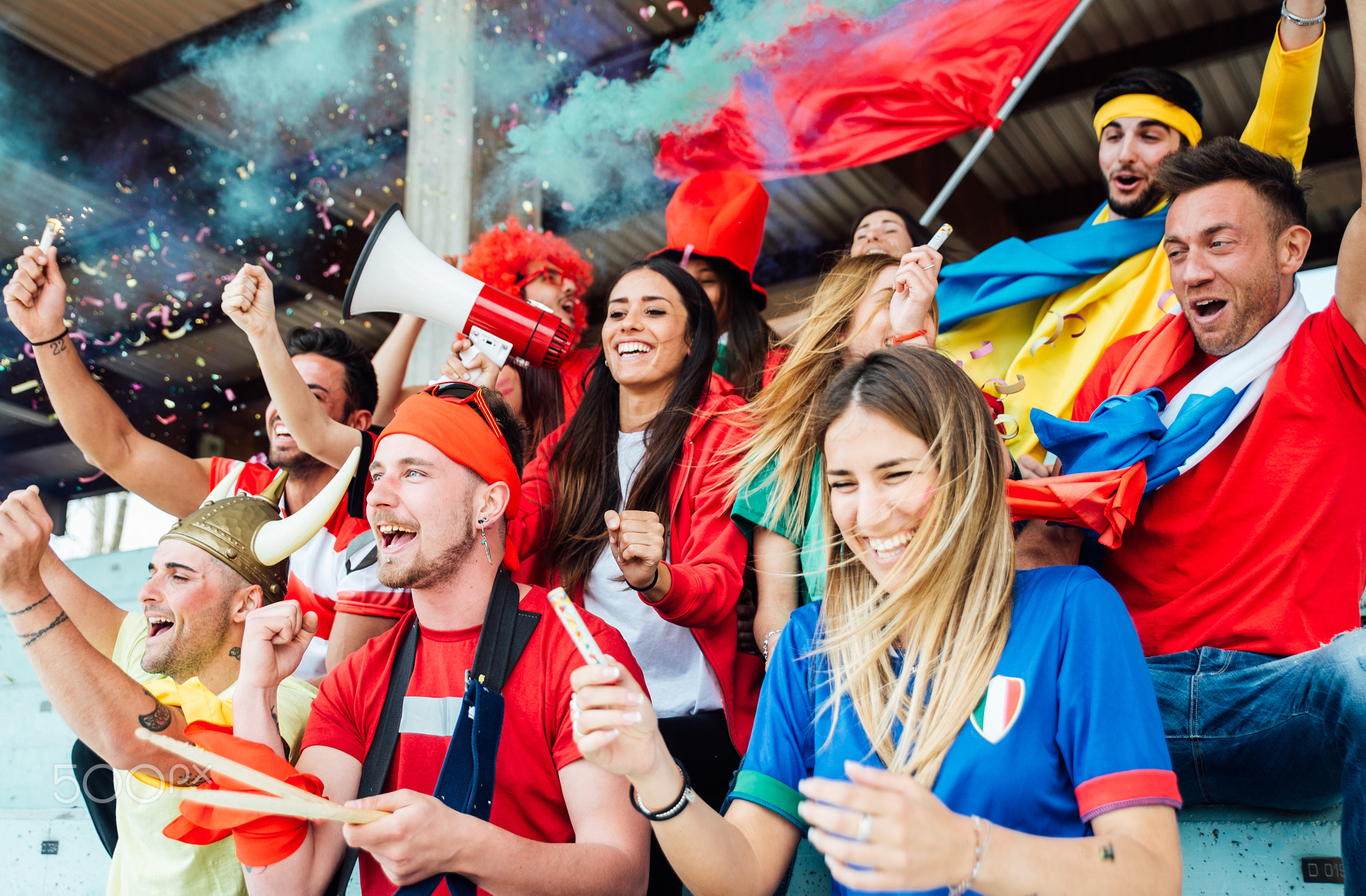 Football fans supporting their team at the arena for the world c