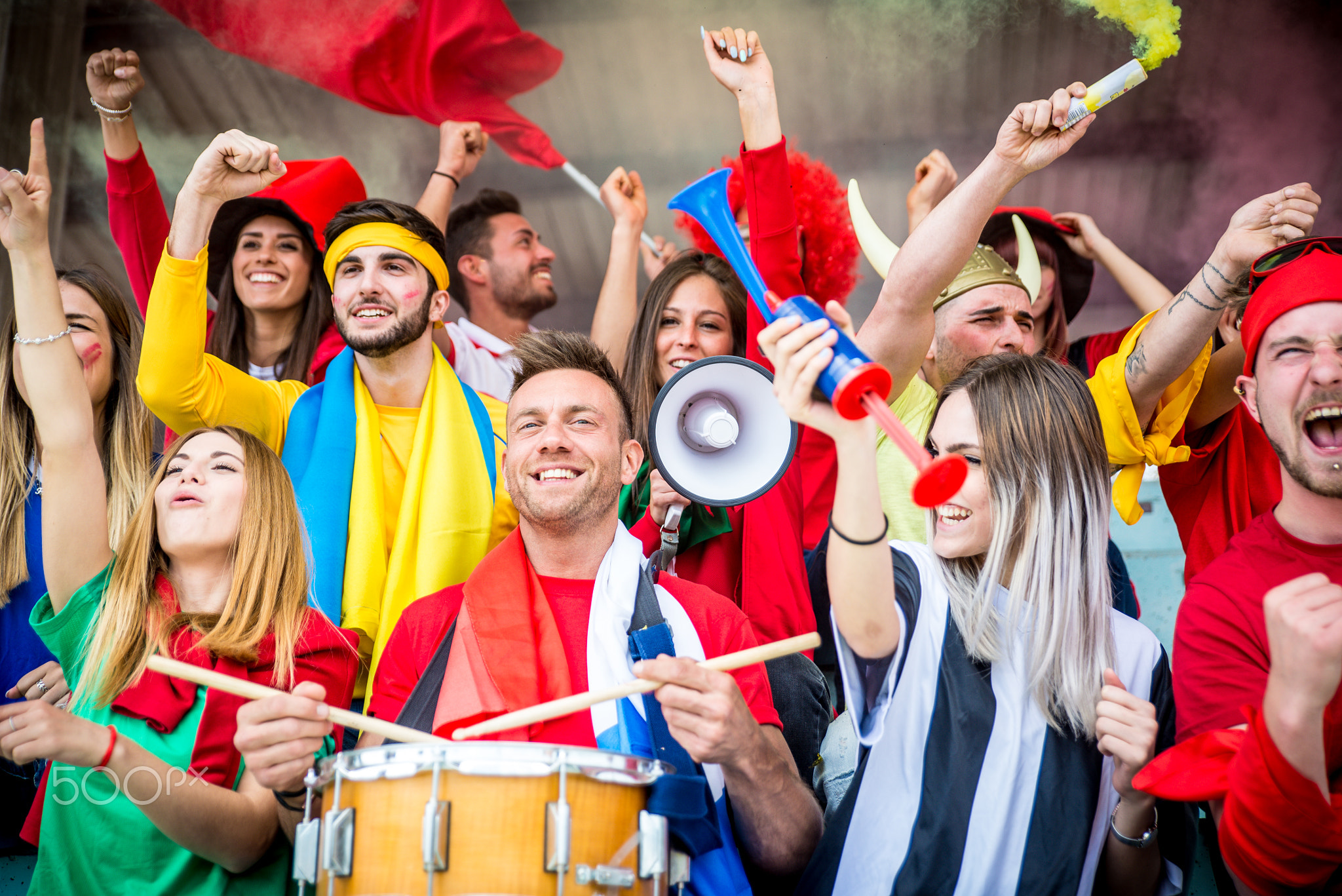 Football fans supporting their team at the arena for the world c