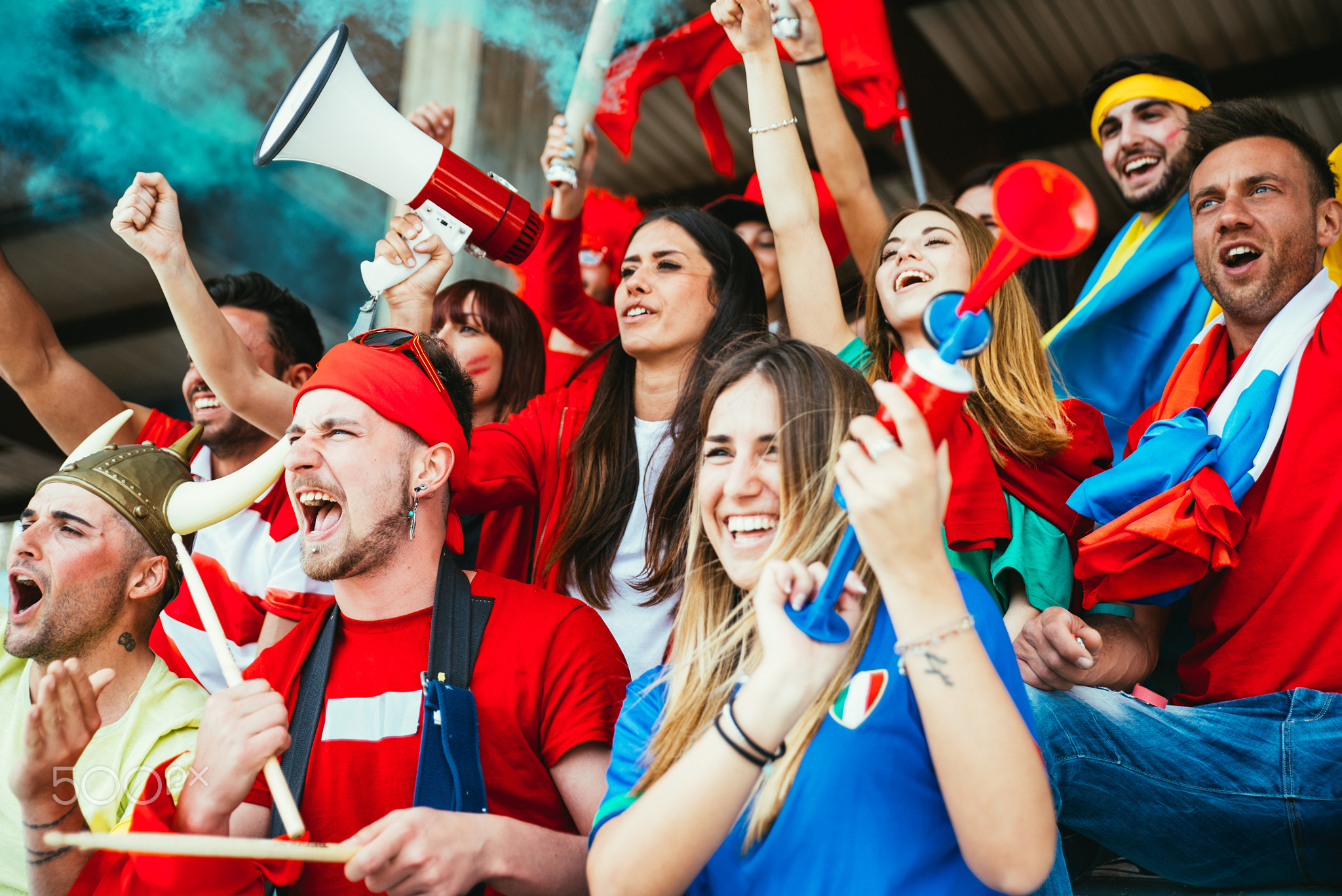 Football fans supporting their team at the arena for the world c