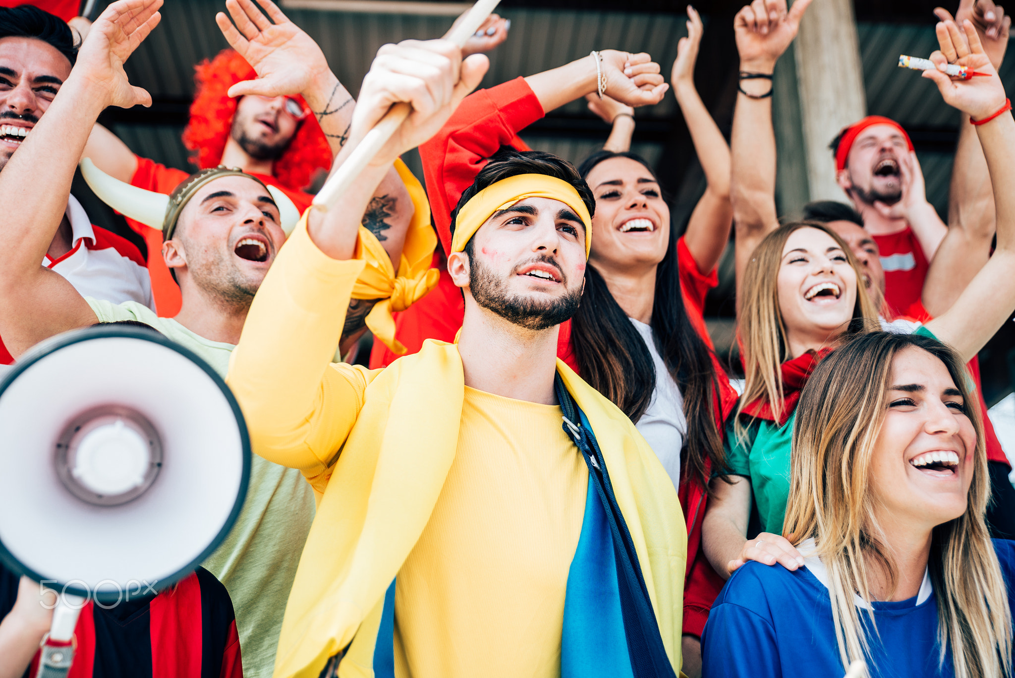 Football fans supporting their team at the arena for the world c