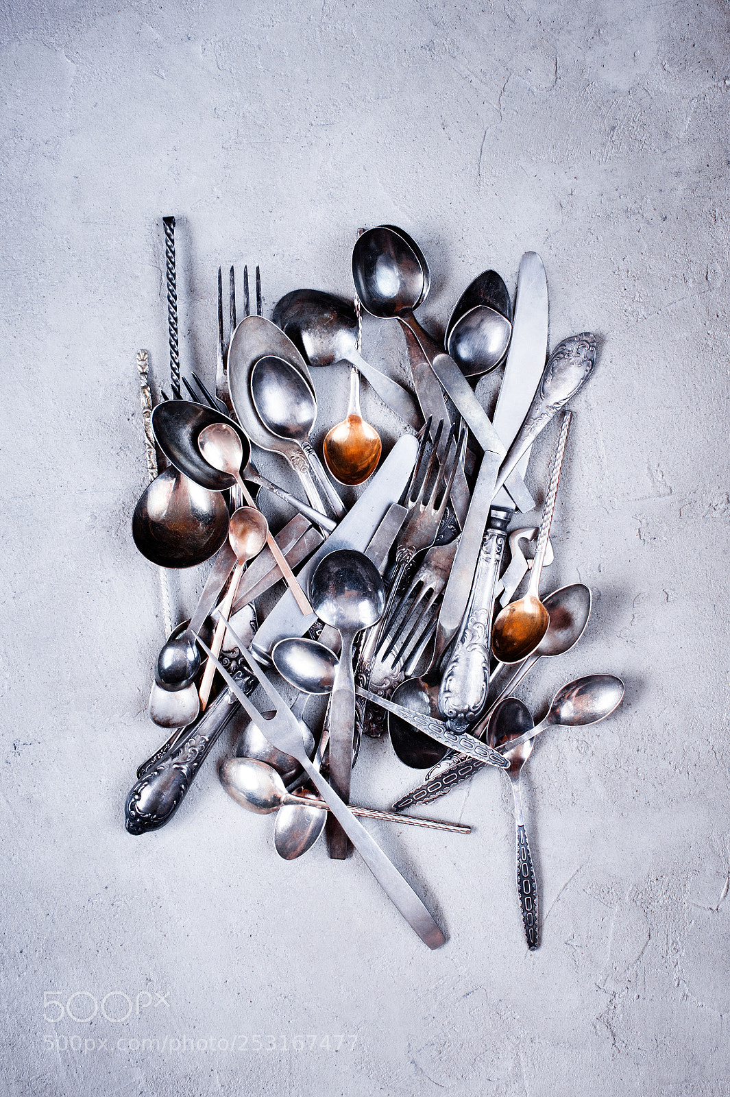 Nikon D700 sample photo. Vintage silverware scattered on photography