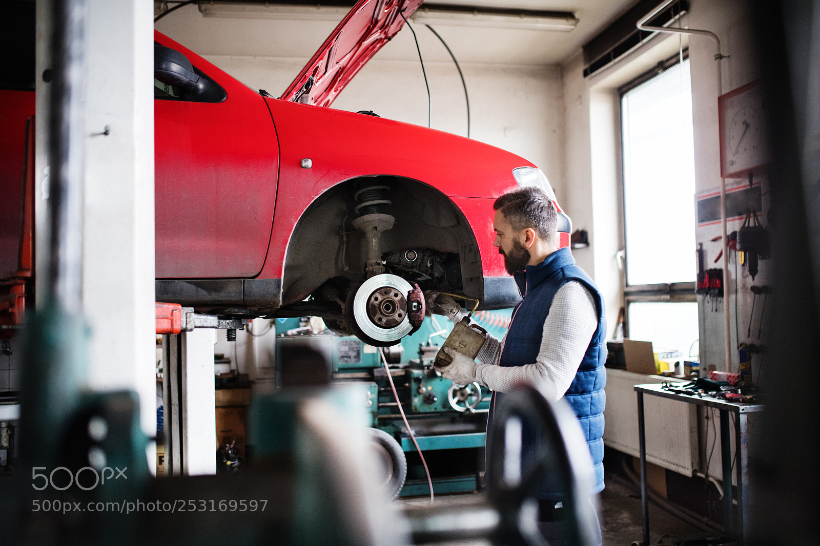 Nikon D5 sample photo. Man mechanic repairing a photography