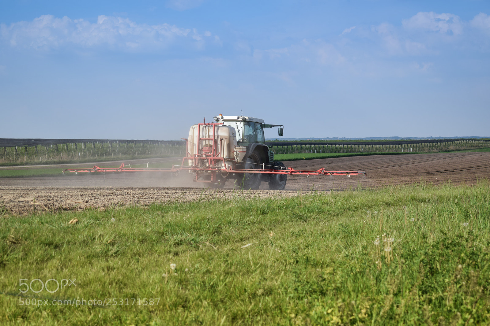 Nikon D3300 sample photo. Tractor is making fertilizer photography