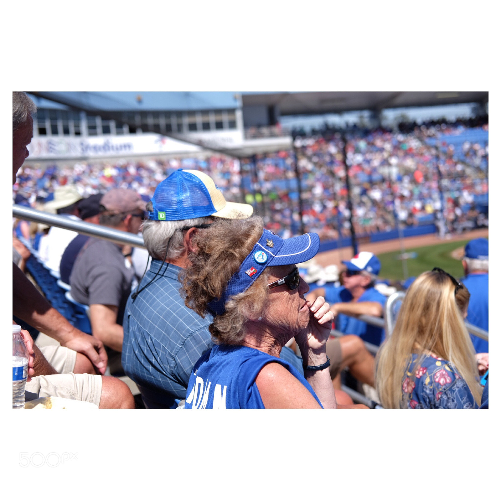 Fujifilm X-T1 sample photo. Fans watch a spring photography