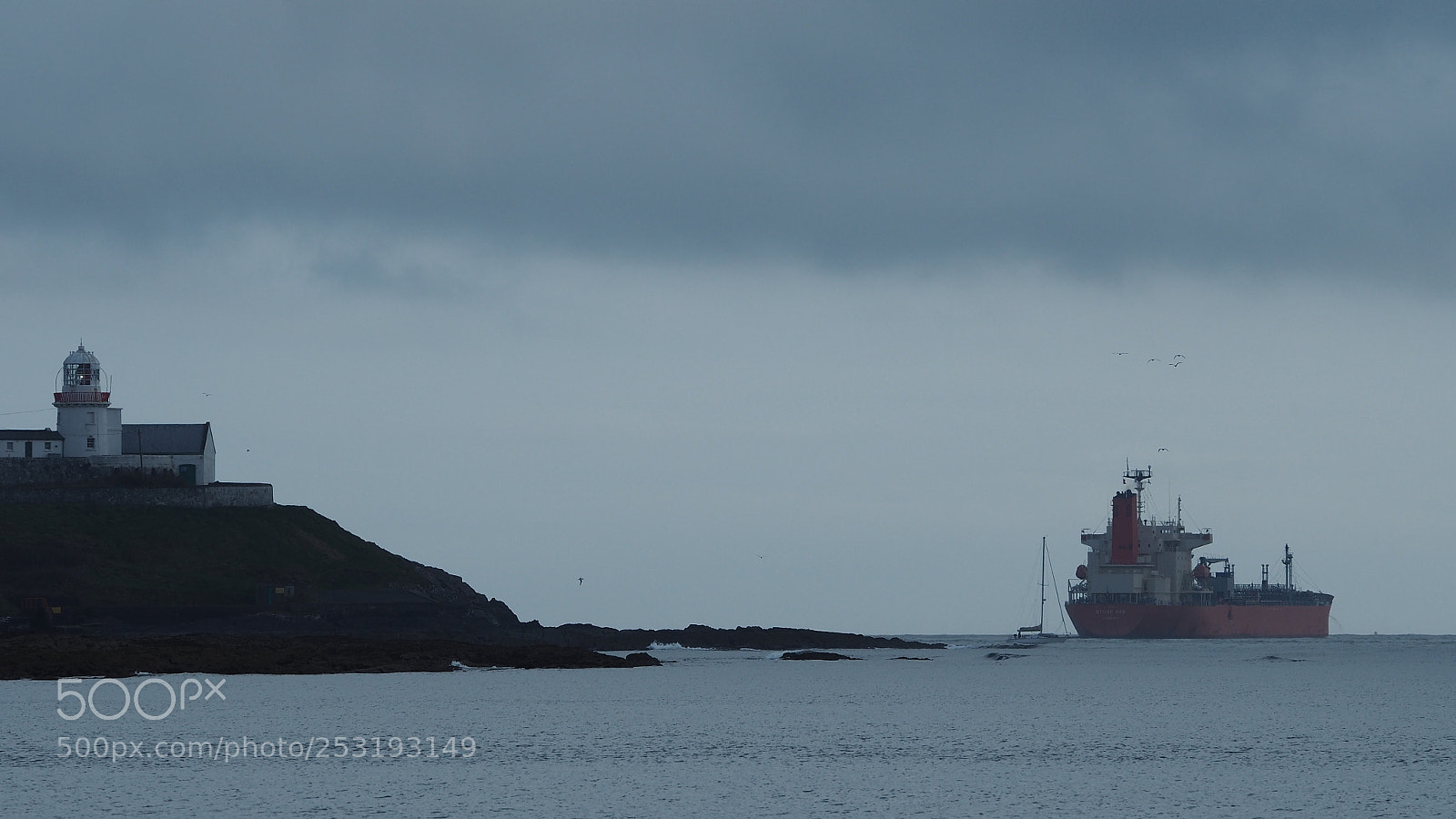 Olympus OM-D E-M5 II sample photo. Roche's point lighthouse and photography