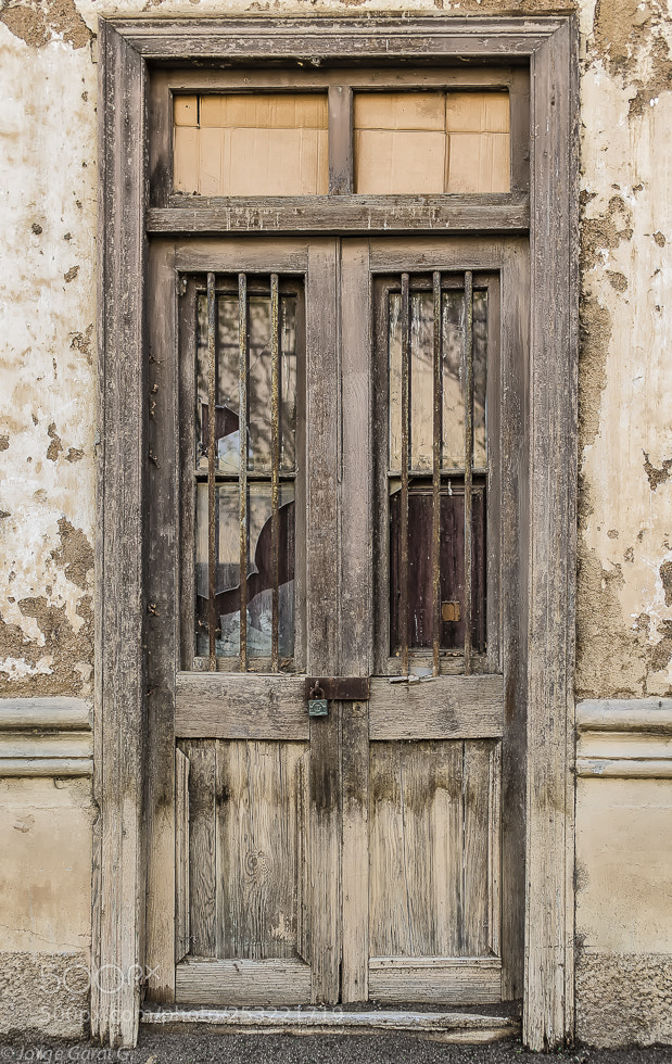 Nikon D700 sample photo. A door closed for photography