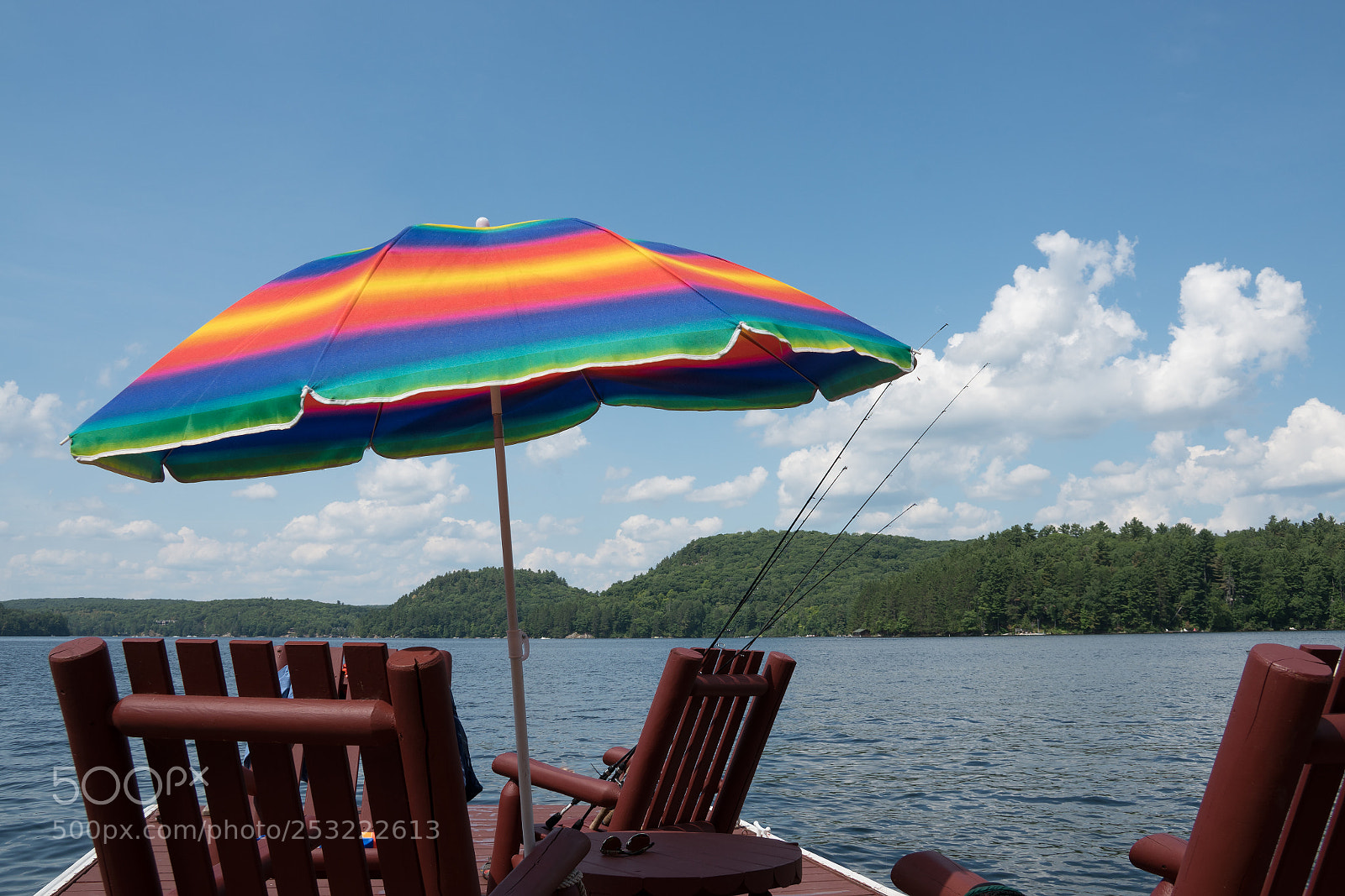 Sony a7R II sample photo. A multi-colored sunshade umbrella photography