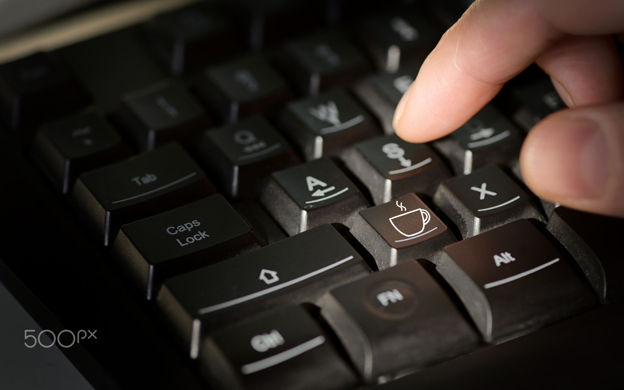 Coffee sign on computer keyboard