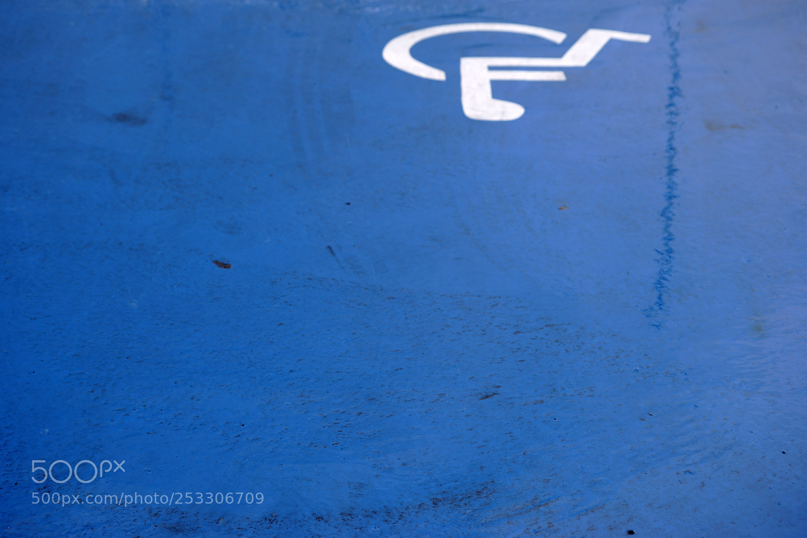 Sony a7 II sample photo. Rainy handicapped parking space photography