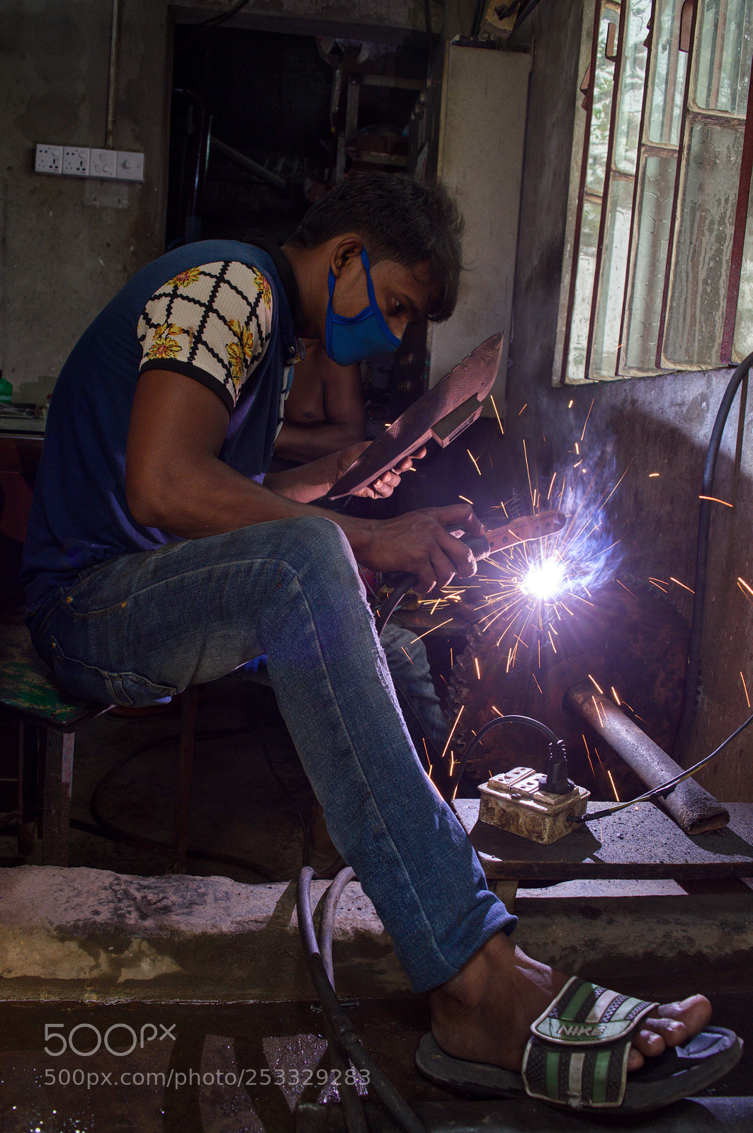 Nikon D3200 sample photo. The welder photography