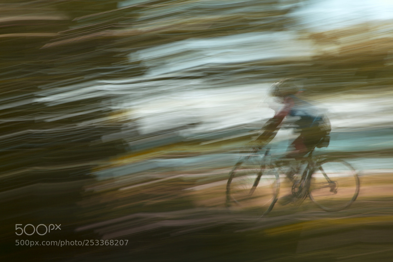 Canon EOS 5D Mark II sample photo. Blurred cyclist on lakeshore photography