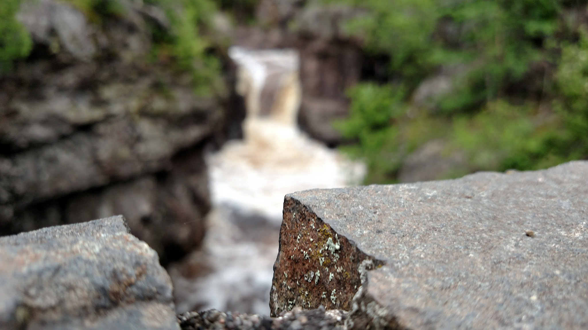 Motorola Droid Turbo sample photo. The river behind the wall photography
