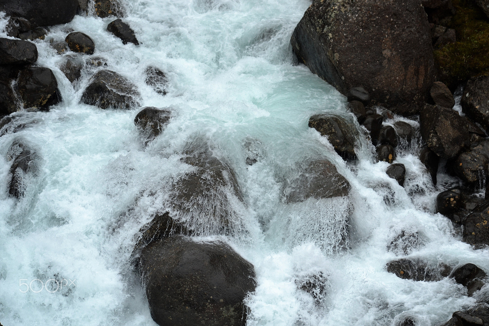 Nikon D3100 sample photo. Water covered rocks photography