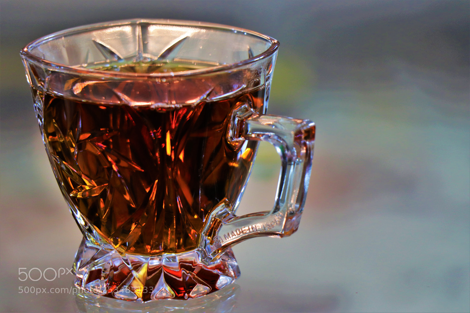 Canon EOS 80D sample photo. Floated tea photography