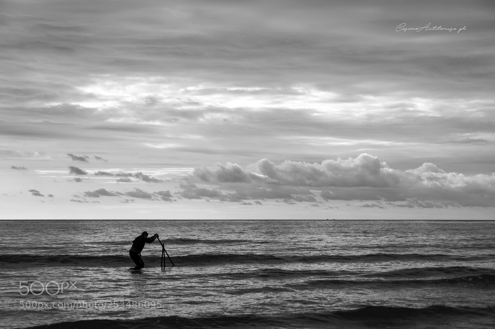 Sony SLT-A37 sample photo. Pescatore di telline photography