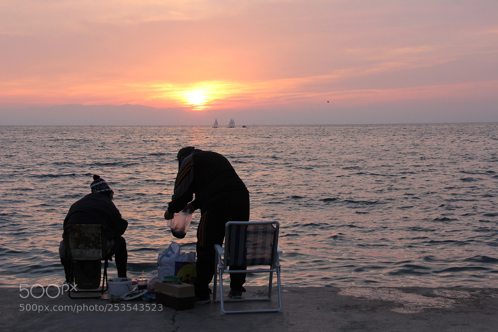 Canon EF-S 18-135mm F3.5-5.6 IS sample photo. Fishing at the sunset photography