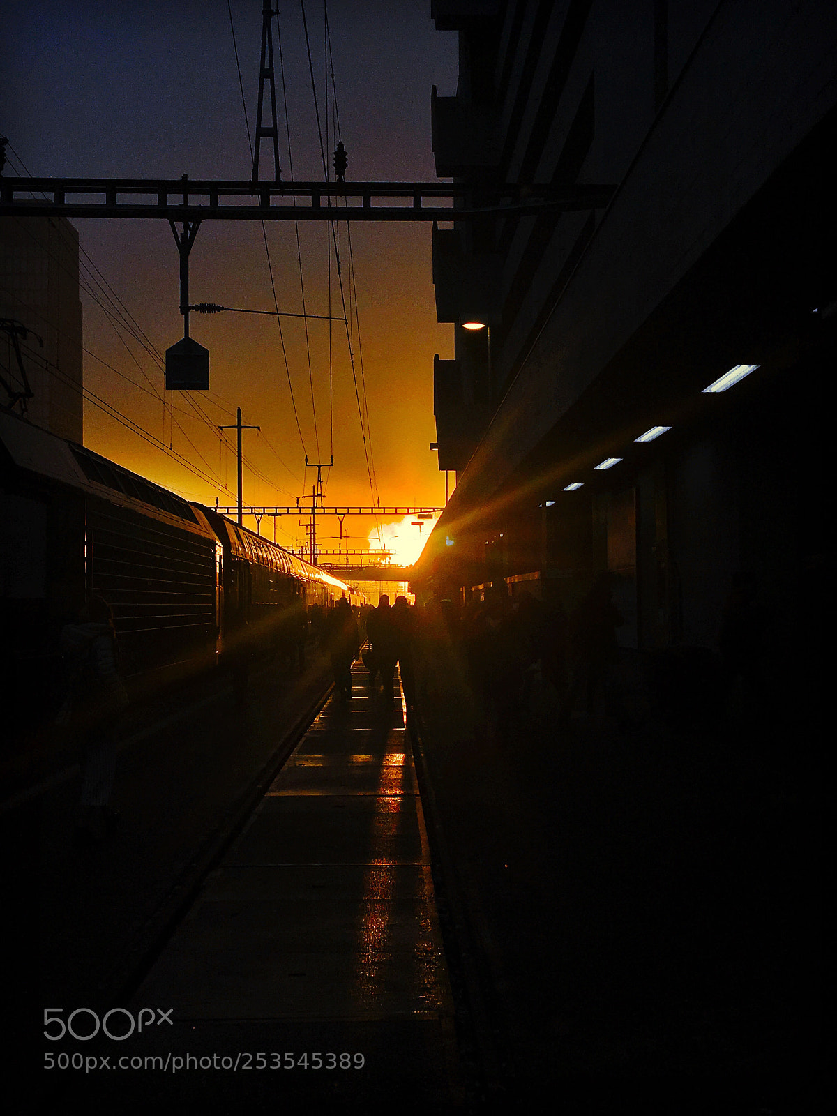Apple iPhone 6s Plus sample photo. Sunset at the trainstation photography