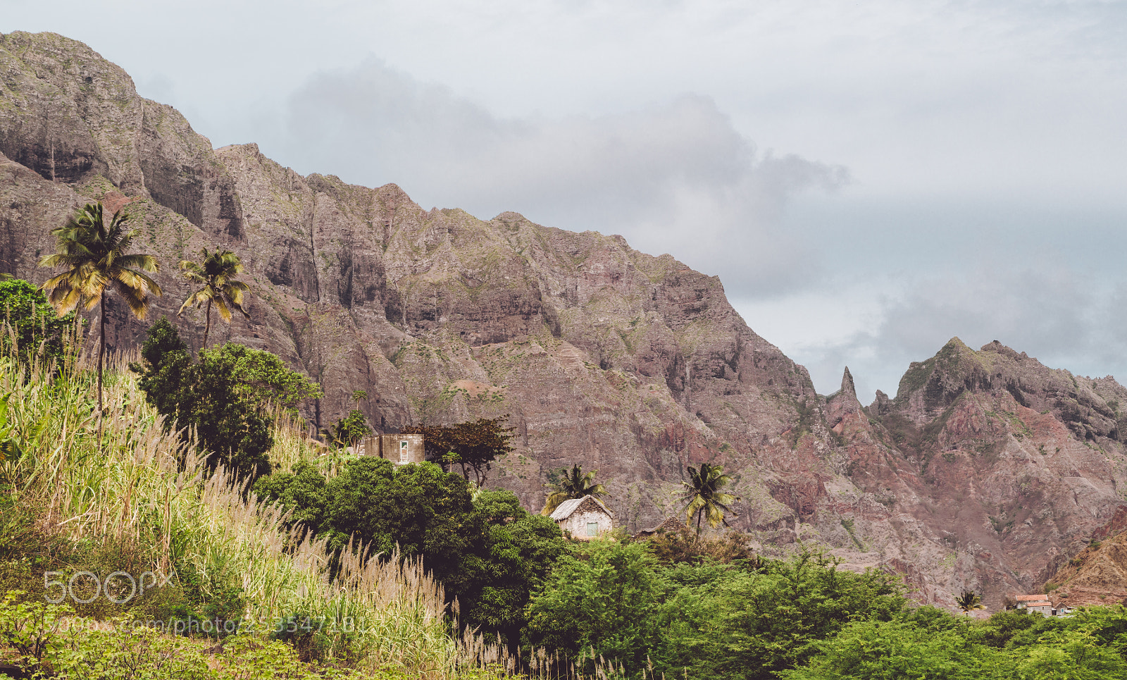 Sony a6500 sample photo. Local stone dwellings surrounded photography