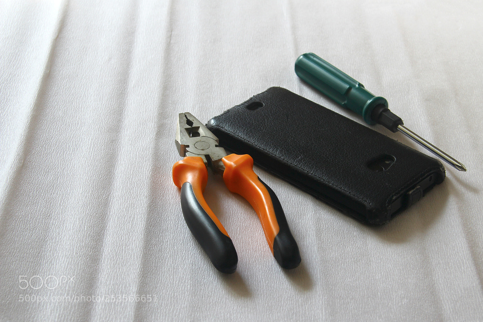 Canon EOS 60D sample photo. Pliers, screwdriver and telephone photography