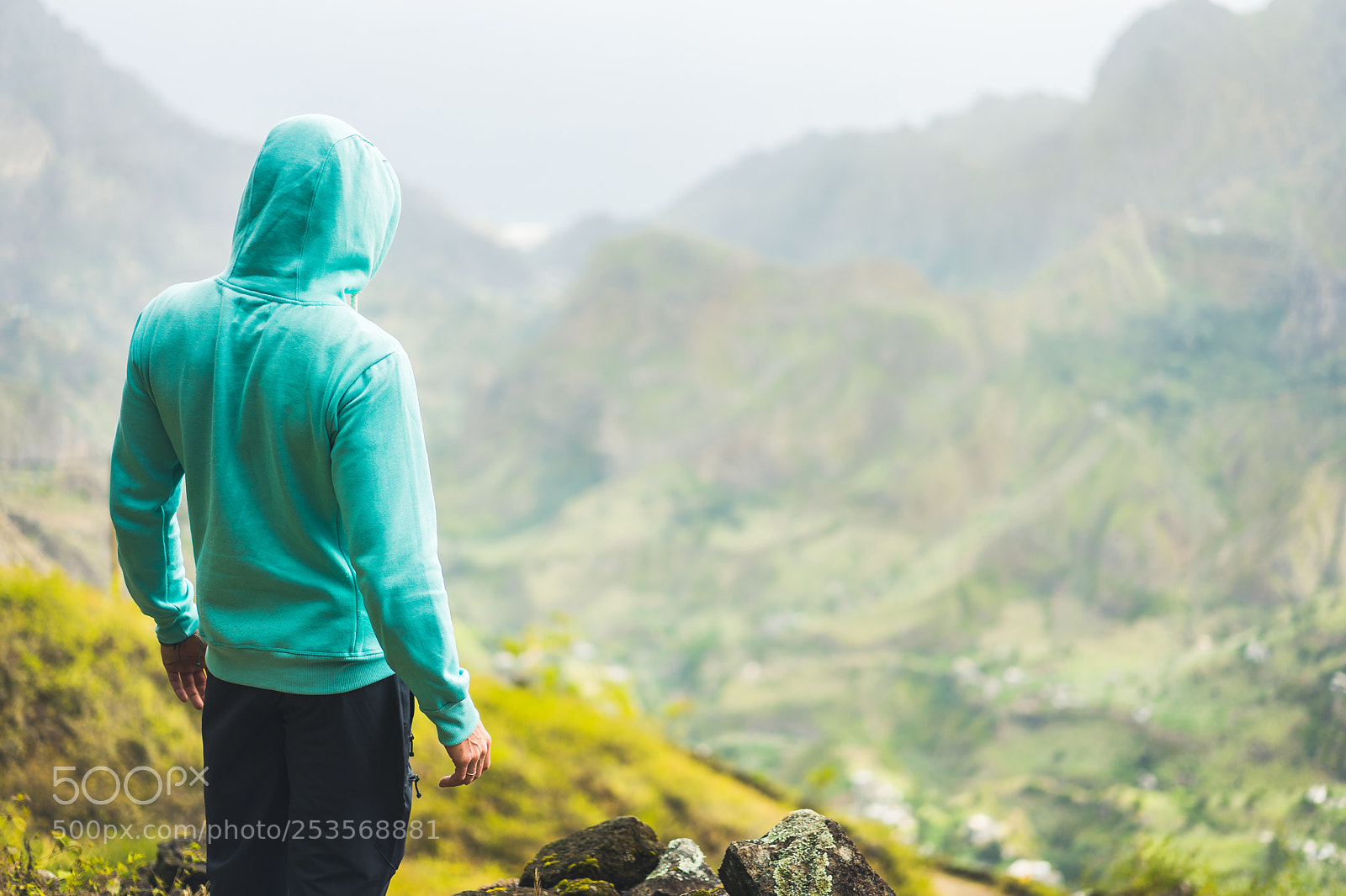 Sony a7 II sample photo. Tourist in hoodie in photography
