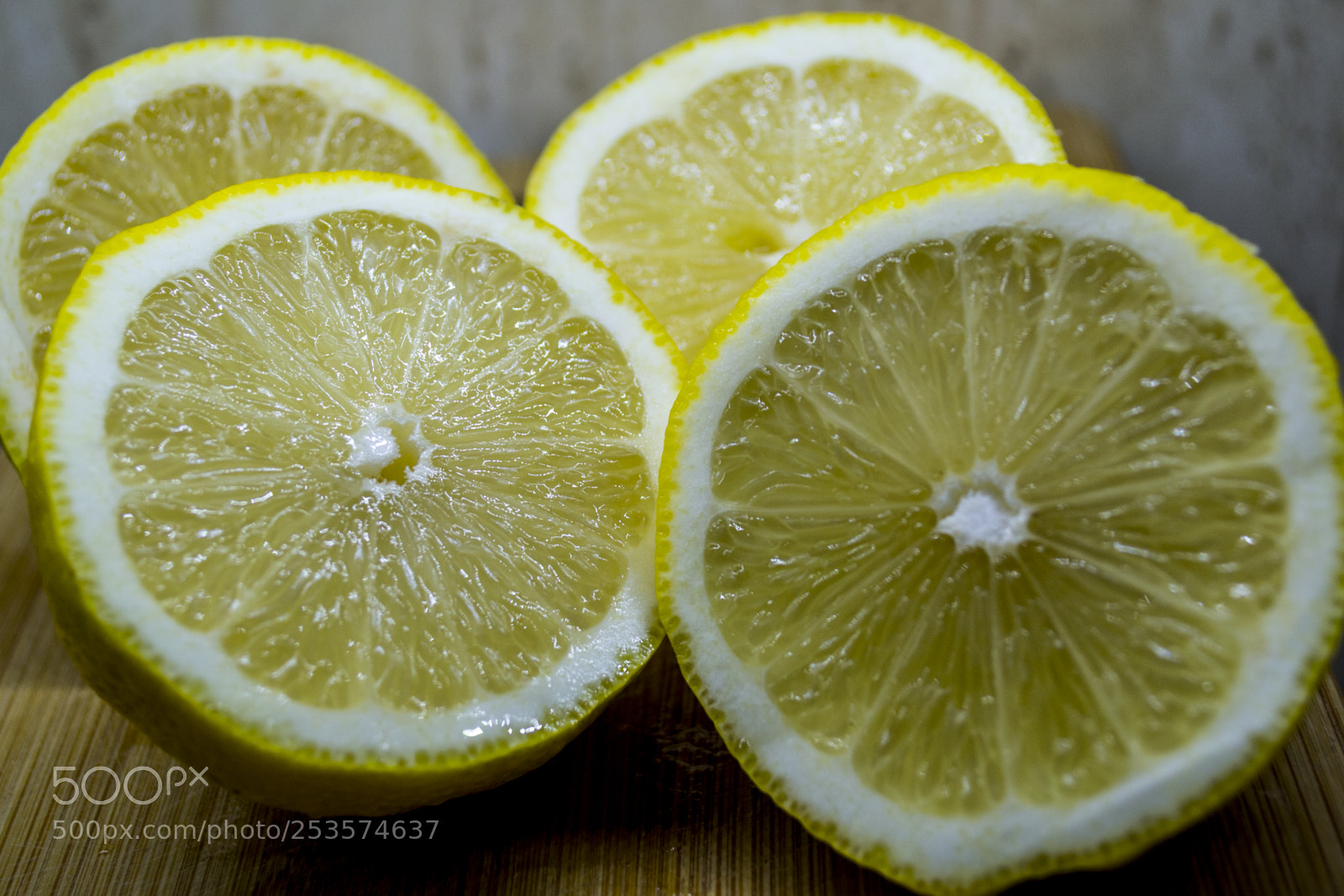 Nikon D3100 sample photo. Fresh lemon halves details photography