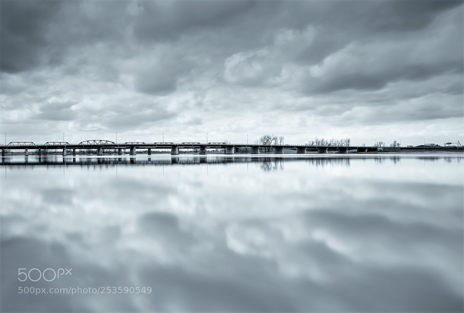 Olympus OM-D E-M5 II sample photo. Bridge over calm water photography