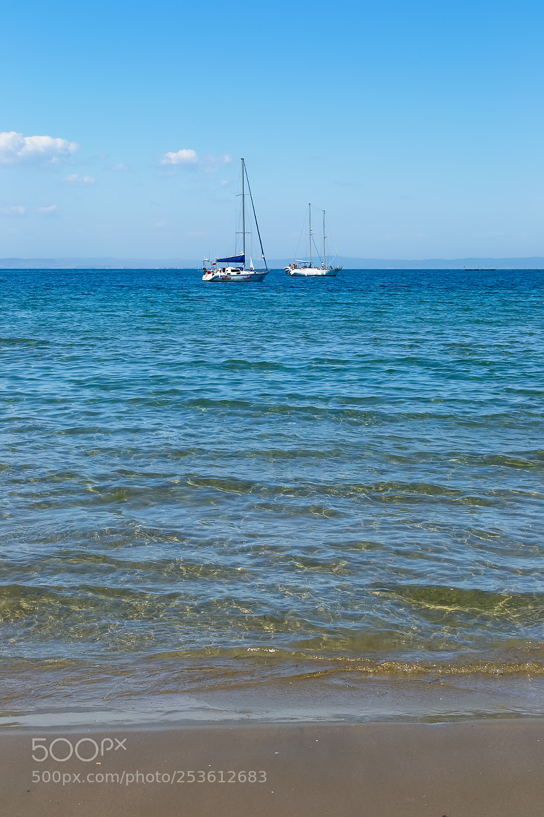 Nikon D3100 sample photo. Two lonely yachts photography