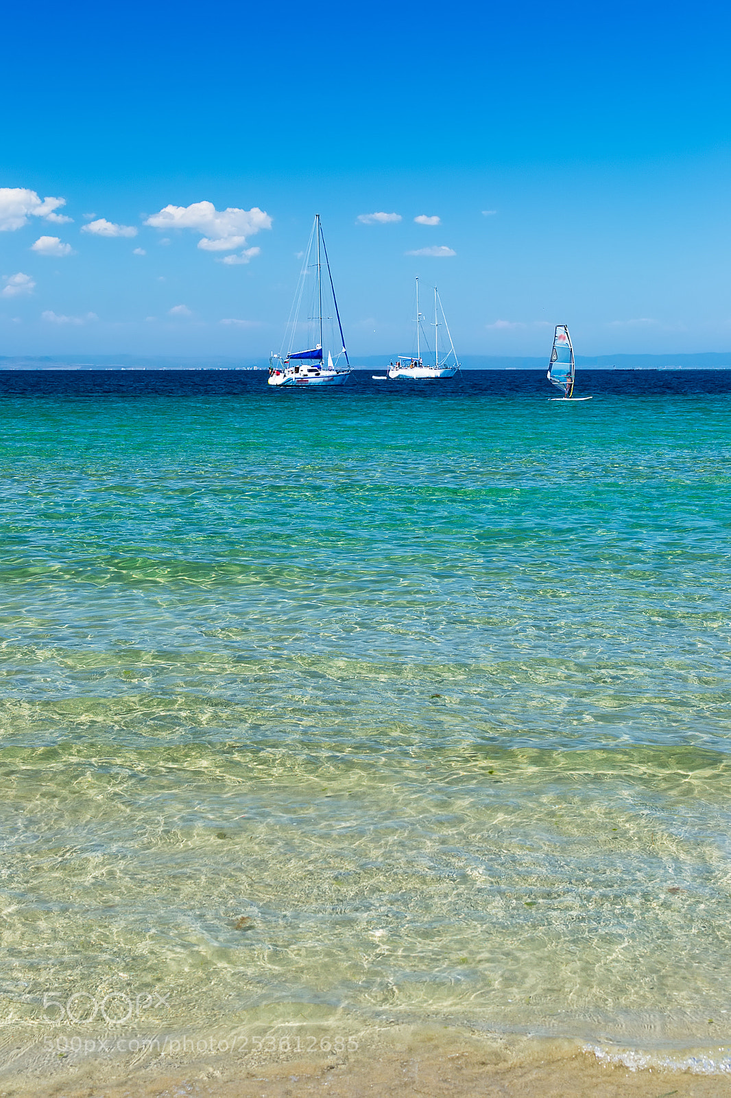 Nikon D3100 sample photo. Two lonely yachts photography