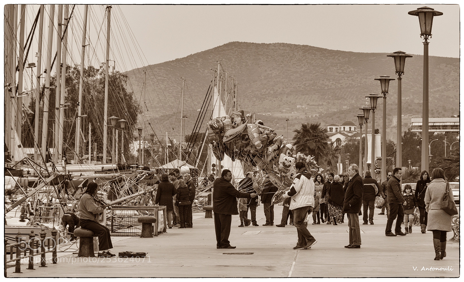 Canon EOS 70D sample photo. Street musician seaside volos photography